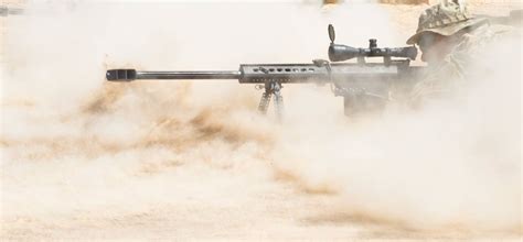 Us Army Scout Sniper Team Marksman Fires A Barrett M107 50 Caliber
