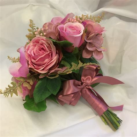 A Wedding Bouquet Colllection Of Dusky Pink Roses Hydrangea And Orchi
