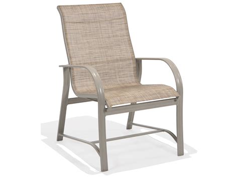 The sleek cherry wood veneer over rubber wood and mdf coordinates well with the contemporary covers on the chairs. Winston Mayfair Sling Aluminum High Back Arm Dining Chair | M65001