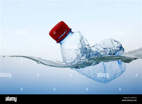 Plastic Water Bottles Pollution In Water Environment Concept Blue