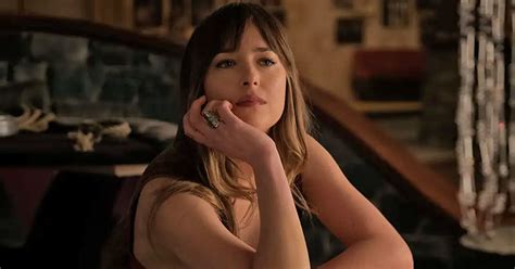 dakota johnson once flaunted her side b b in a gucci bejewelled top with deep plunging neckline