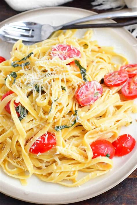 Pasta With Garlic Parmesan Cream Sauce Tomatoes And Basil