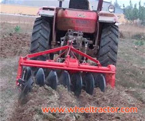 disc plough disc plow tractor ploughing