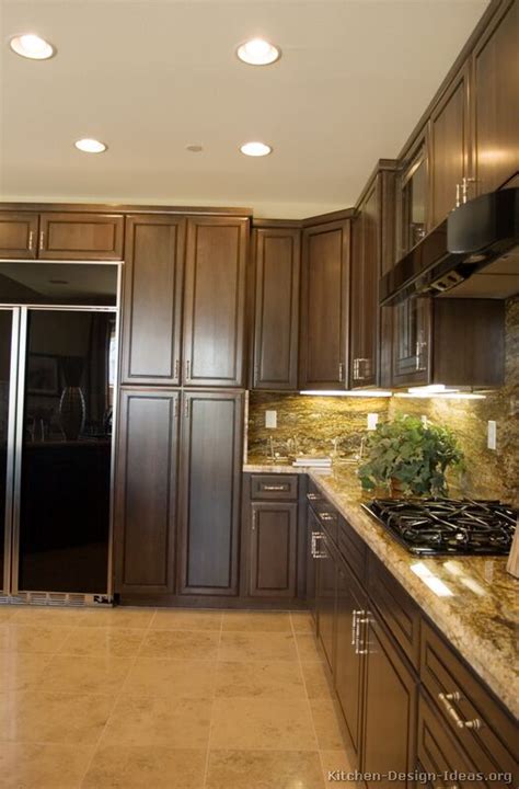 If you definitely want to paint your cabinets a color, consider using a lighter color on top and the deeper color on bottom, or vice versa. Pictures of Kitchens - Traditional - Dark Wood Kitchens ...