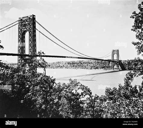 The George Washington Bridge In New York Leads Over The Hudson River