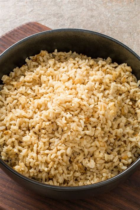 The basic water to white rice ratio is 2 cups water to 1 cup rice. For our brown rice recipe, we found that 2 1/3 cups water ...