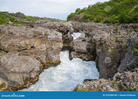 Waterfall Barnafossar In Hvita River In Borgarfjordur In The