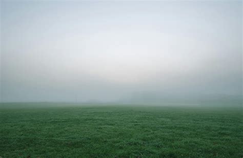 Selective Photography Of Green Grass Field Under White And Gray Sky