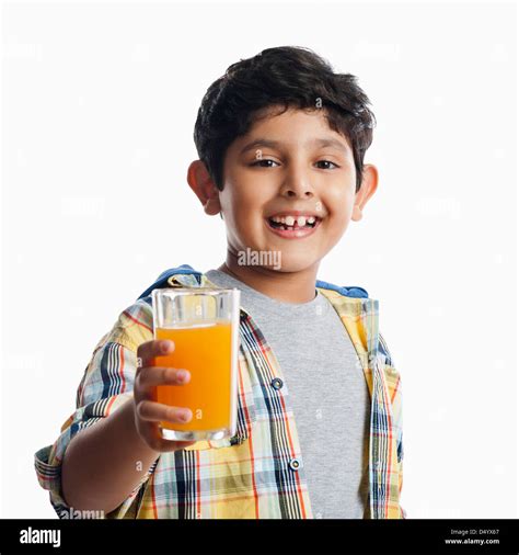 Boy Drinking Juice Stock Photo Alamy