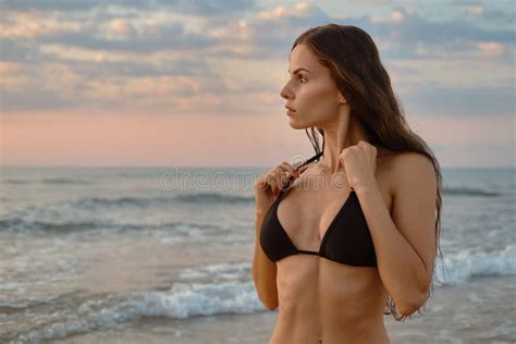 Woman Posing On Beach Near The Sea At Sunrise Stock Photo Image Of