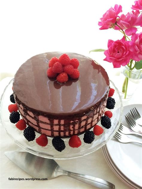 Chocolate ganache can be a filling, dip, spread, frosting, topping, or layer in a cake. Chocolate Cake with Raspberry Mousse filling and Dark ...