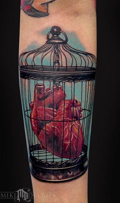 Caged Real Human Heart Tattoo On Arm