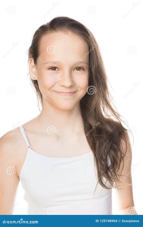 Beautiful Smiling Caucasian Preteen Girl In Tank Top With Loose Hair Isolated On White Stock