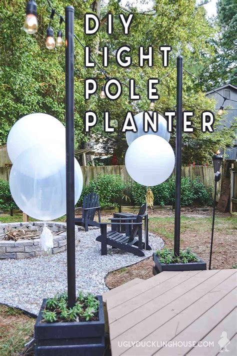 These mobile string light poles are the perfect easy diy for spring. DIY Outdoor Light Pole Planters Around the Deck | Free ...