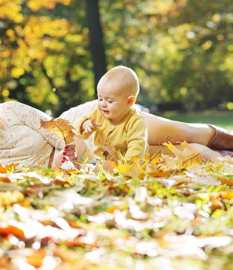 Little Child Playing Autumn Leaves Stock Image Image Of Enjoyment