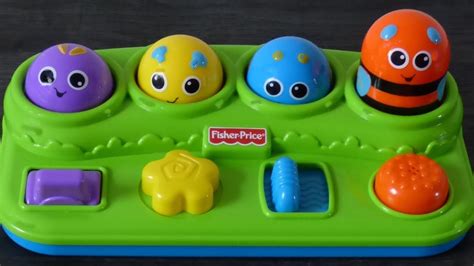 Fisher Price Brilliant Basic Peek A Boo Pop Up Activity Bug Toy For