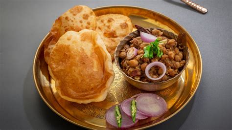 It mainly includes my other detailed recipes like poori, ragi roti, rumali roti, how to make roti, chur chur naan, lauki thepla, garlic naan, luchi, bajra roti, chole bhature. The Magic of Chole Bhature