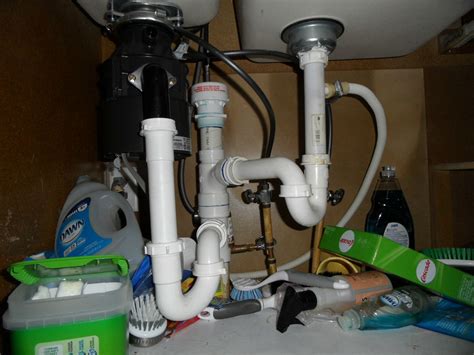 End outlet disposer kit into a double bowl sink with a garbage disposal. Installing a second garbage disposal in a dual sink ...