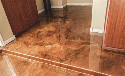 Metallic epoxy floor coatings are a hot new trend that is slowly finding its way into the home as a very high tech and exotic looking garage flooring option. Metallic epoxy - Broward Custom Concrete Solutions