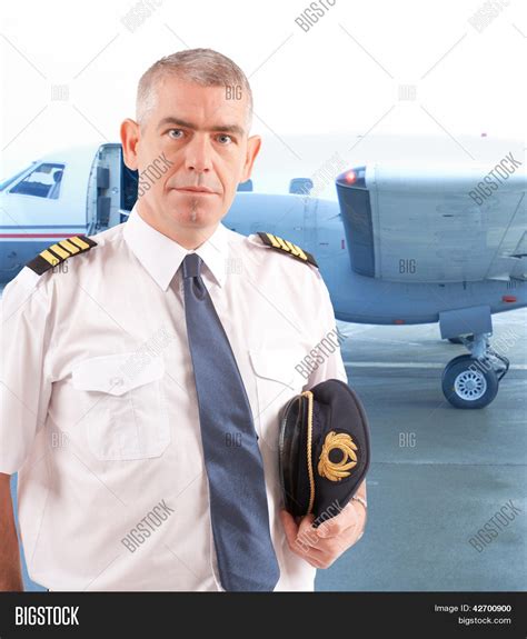 Airline Pilot Wearing Image And Photo Free Trial Bigstock