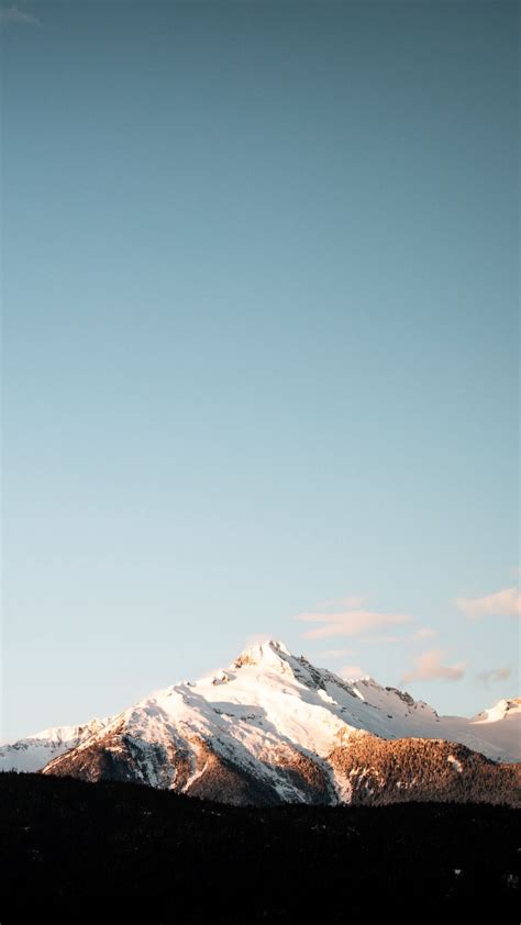 Download Wallpaper 1080x1920 Mountains Peak Sky Snowy Outdoors