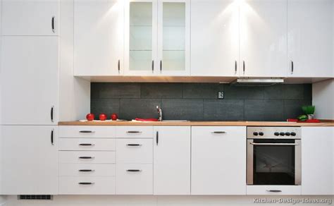 Cabinets like these are ideal for minimalist kitchens that prize both function and sleek design. Pictures of Kitchens - Modern - White Kitchen Cabinets