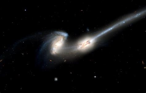Halton arp's atlas of peculiar galaxies. Wallpaper Stars, Galaxies, Galaxy, NGC 4676, Colliding ...