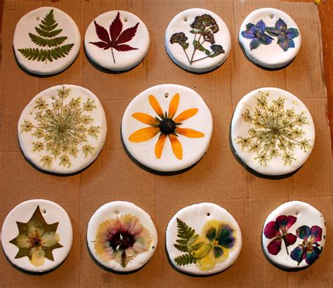 Children love creating art from their own hand prints. Twig and Toadstool: Pressed Flower Ornaments