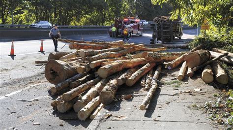 Log Truck Spills Timber On Highway 20 Crime And Courts