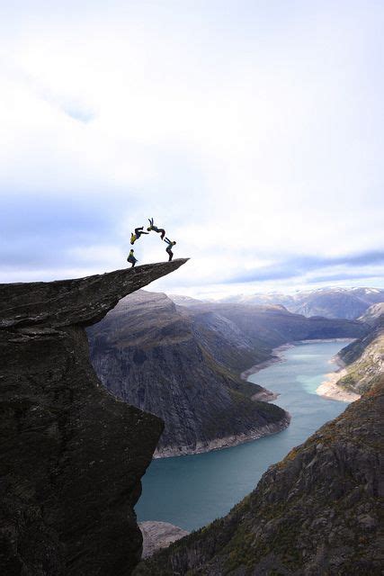 Jumping On Trolltunga Rock Norway Beautiful Places Places Places