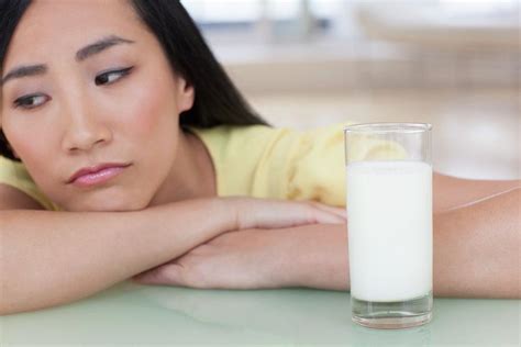 Woman Looking Sad With Glass Of Milk Photograph By Ian Hooton Pixels