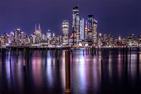 New York City Manhattan Midtown Panorama At Night With Skyscrapers