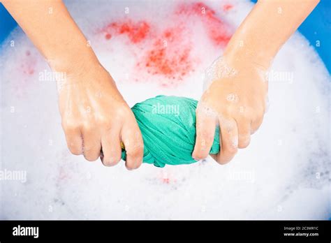 Closeup Young Asian Woman Use Hands Washing Color Clothes In Basin