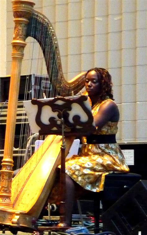 Beautifully Play A Gold Harp Wear A Gold Dress Brandee Younger At