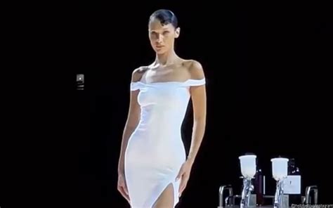 Topless Bella Hadid Gets Spray On Dress On Runway At Paris Fashion Week
