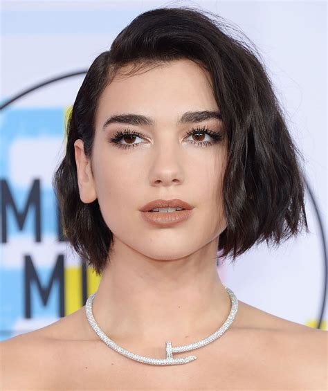 After working as a model, she signed with warner bros. Red Carpet - Dua Lipa at 2018 American Music Awards in Los ...