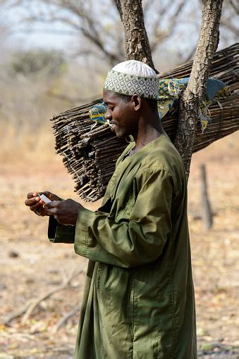 Unidentified Fulani Man In National Clothes Holds A Syringe In The Local Village Fulanis Are