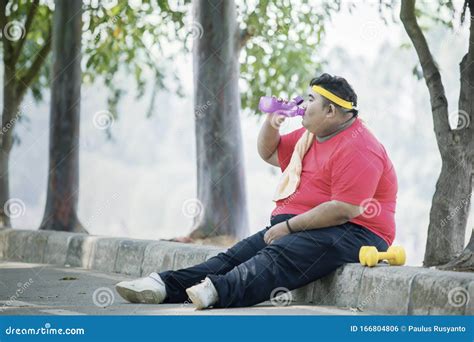 Fat Asian Man Drinking A Bottled Water Stock Photo Image Of Model