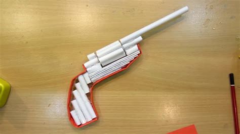How to make a paper pocket mini gun that shoots rubber band easy paper gun tutorials. How To Make A Paper Revolver That Shoots Paper Bullet ...