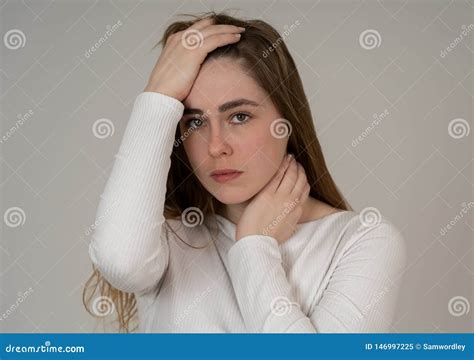 Portrait Of Sad And Intimidated Woman Isolated In White Background