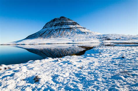 Kirkjufell View During Winter Snow Which Is A High Mountain On The