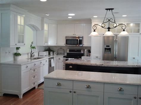 You may still find some images that we auto summary from some website. White Painted Traditional Mission Style Cabinets