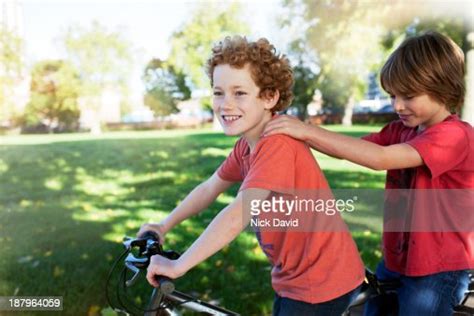 Boys Playing Outside In The Park High Res Stock Photo Getty Images