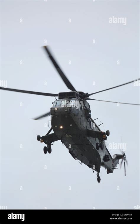 A Royal Navy Sea King Mk4 Helicopter Performs During A Beach Assault At