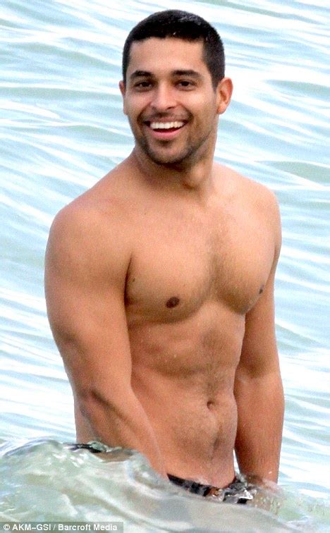 Shirtless Wilmer Valderrama Takes A Dip In The Miami Surf With Friends