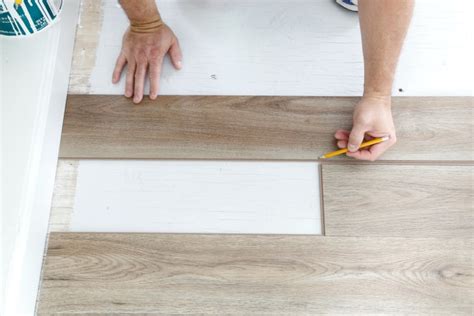 How To Install Luxury Vinyl Plank Flooring Sand And Sisal