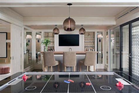 Hang wallpaper in a bright print on your back wall and paint cabinets in an equally cheerful hue. Top 70 Best Finished Basement Ideas - Renovated Downstairs ...