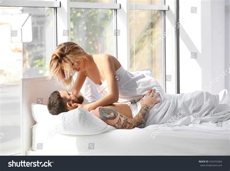 Passionate Beautiful Couple Bedroom Enjoying Foreplay