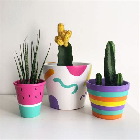 The little clay bowls are made to inspire, bring joy and happines for you or your loved. Hand-painted pots and cacti | Diy flower pots, Painted ...