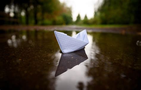 Paper Boat Floating On Water In Autumn Park Edwards Performance Solutions
